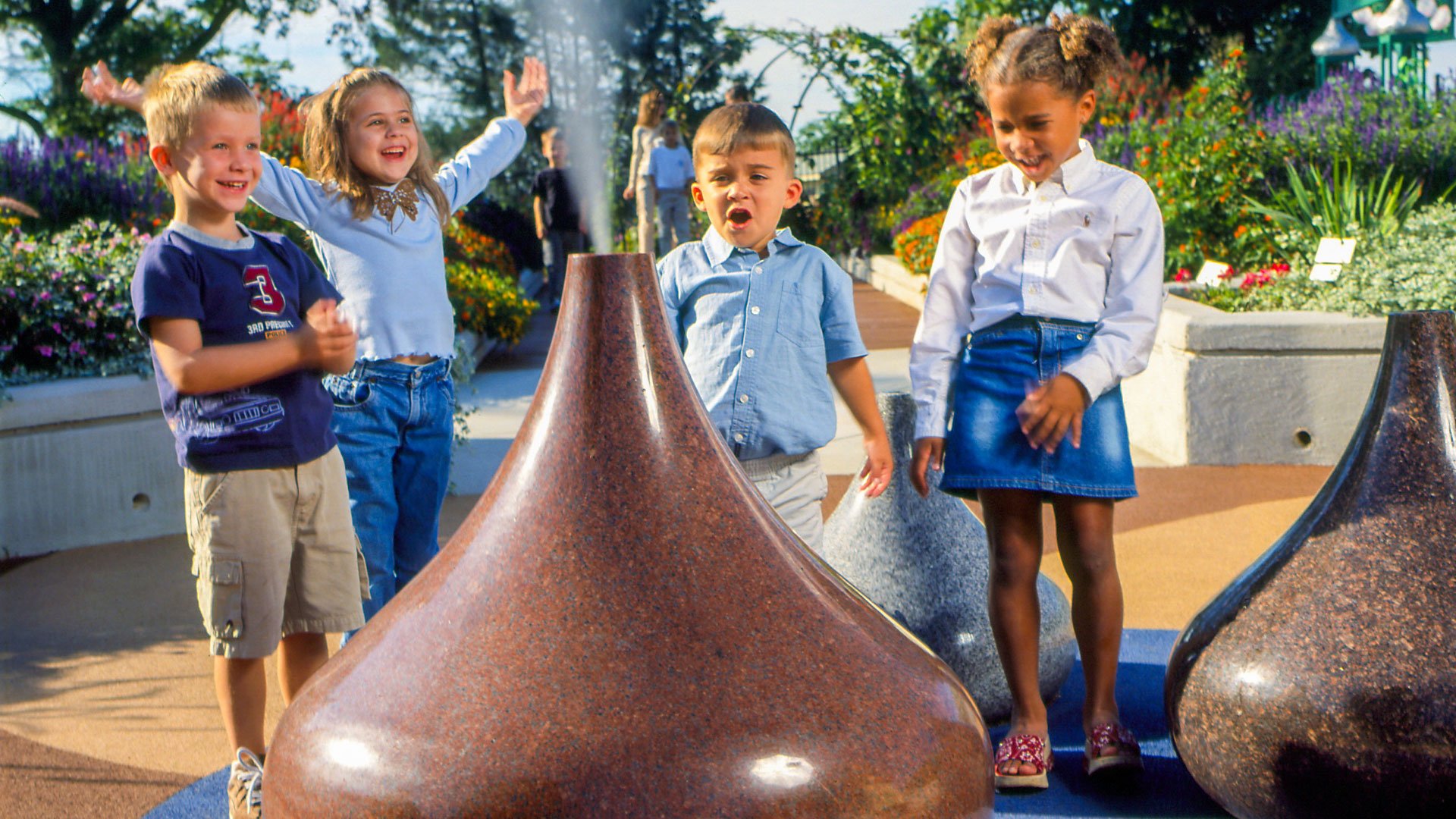 kids-gathered-around-a-hershey-kiss-emitting-steam-saturated.jpg