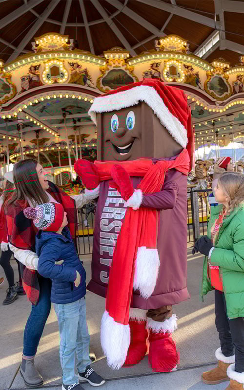 family-with-hershey-bar-character-carousel-hersheypark.jpg