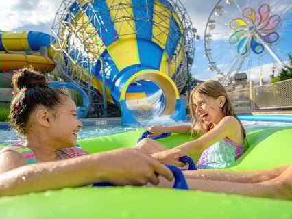 two-girls-exiting-coastline-plunge-water-slide.jpg