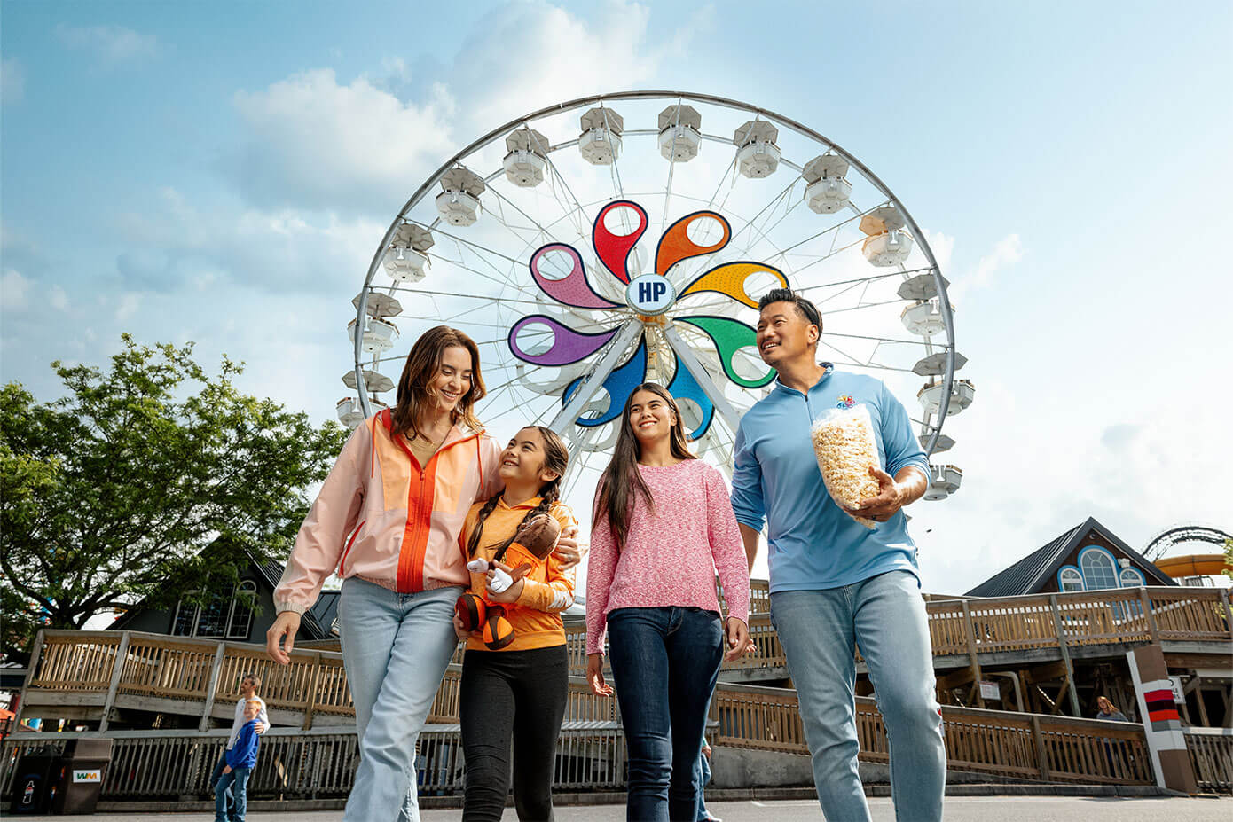 family-at-hersheypark-ferris-wheel-dad-holding-popcorn-bag.jpg