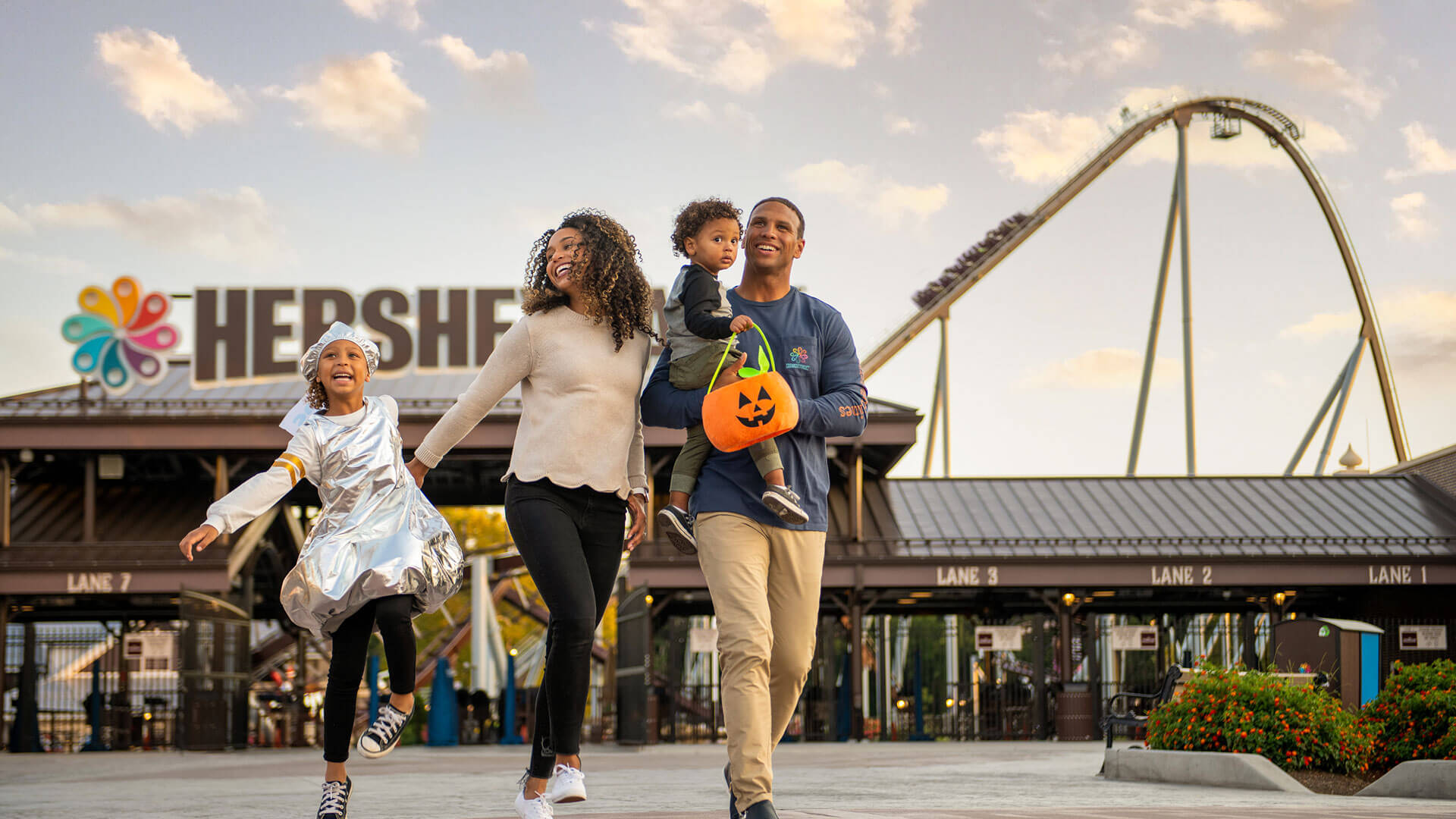 smiling-family-in-front-of-hersheypark-during-hersheypark-halloween.jpg