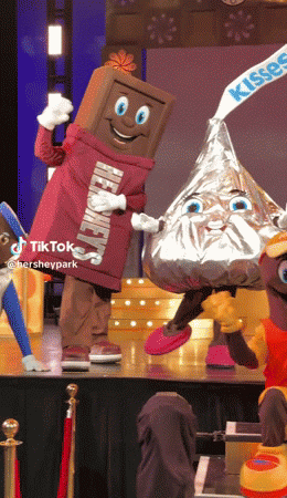 Characters-waving-during-Twizzler-Show.gif