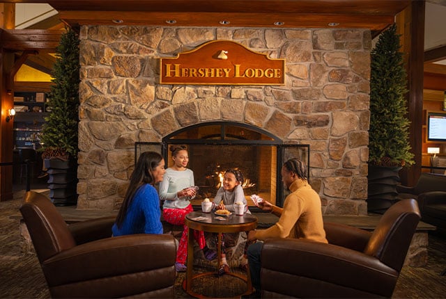 mom-dad-and-kids-fireplace-hershey-lodge.jpg