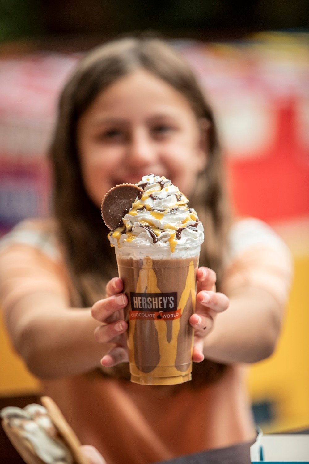 woman-holding-chocolate-world-milkshake.jpg