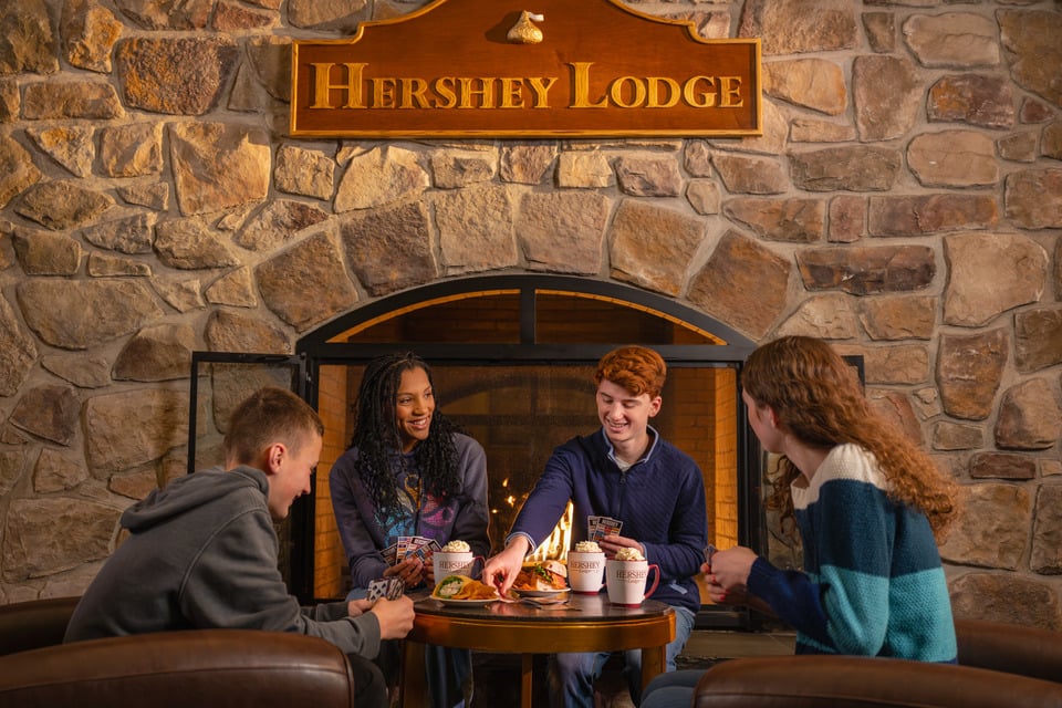 teens-in-front-of-fireplace-at-hershey-lodge.jpg