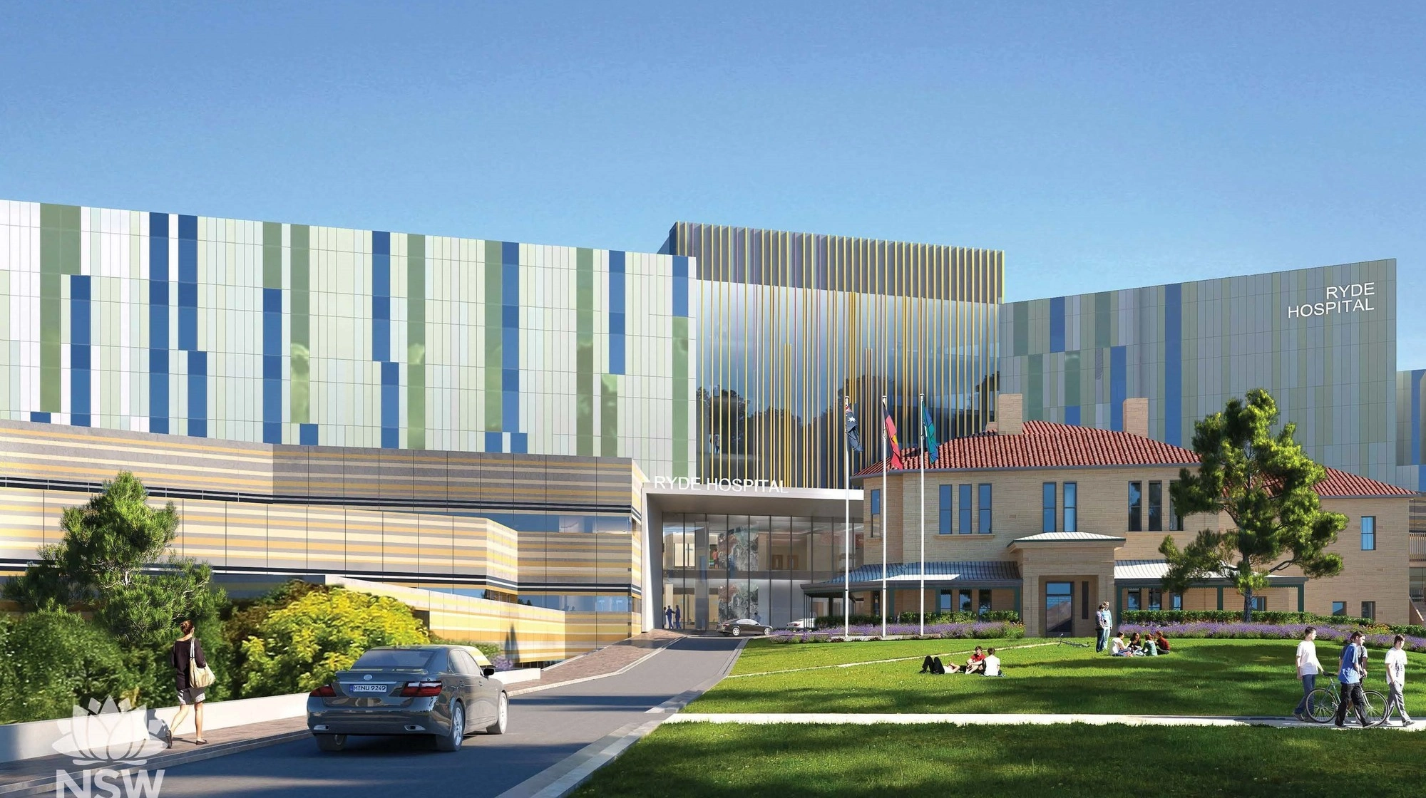 Hôpital Ryde moderne mêlant design contemporain et architecture patrimoniale avec une pelouse verte.