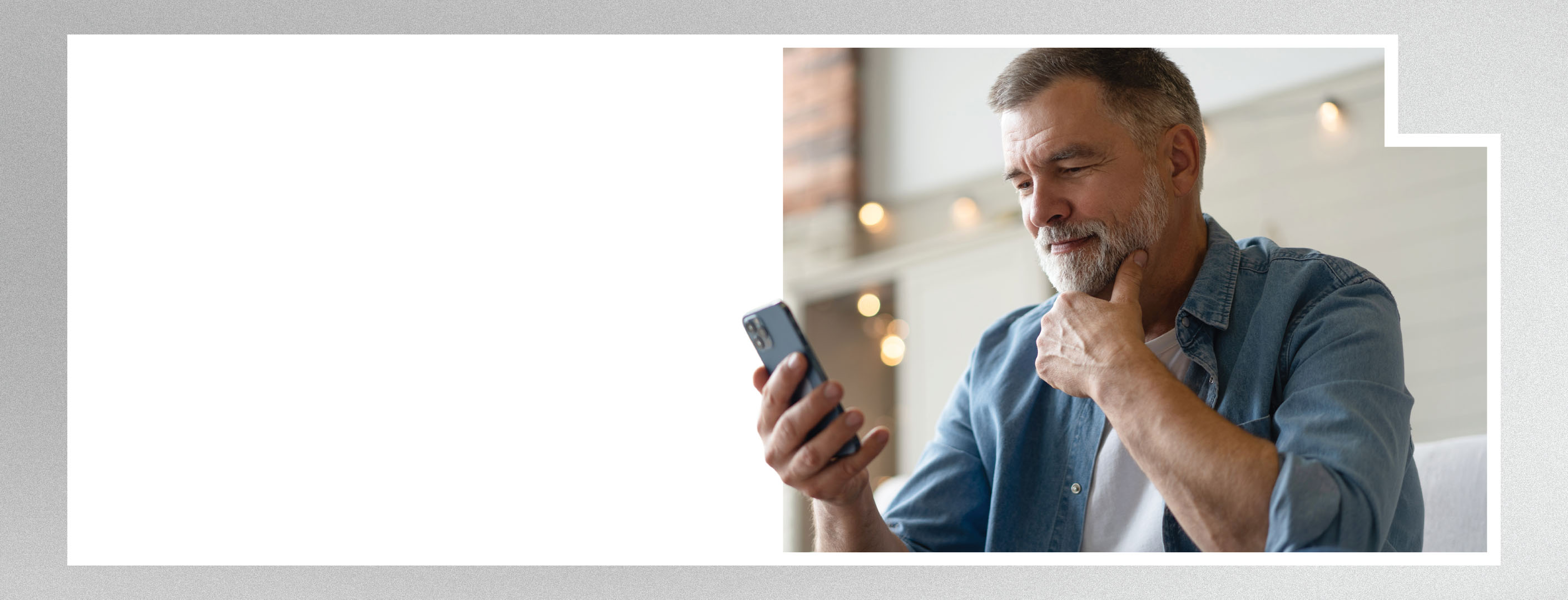 man looking at smart phone