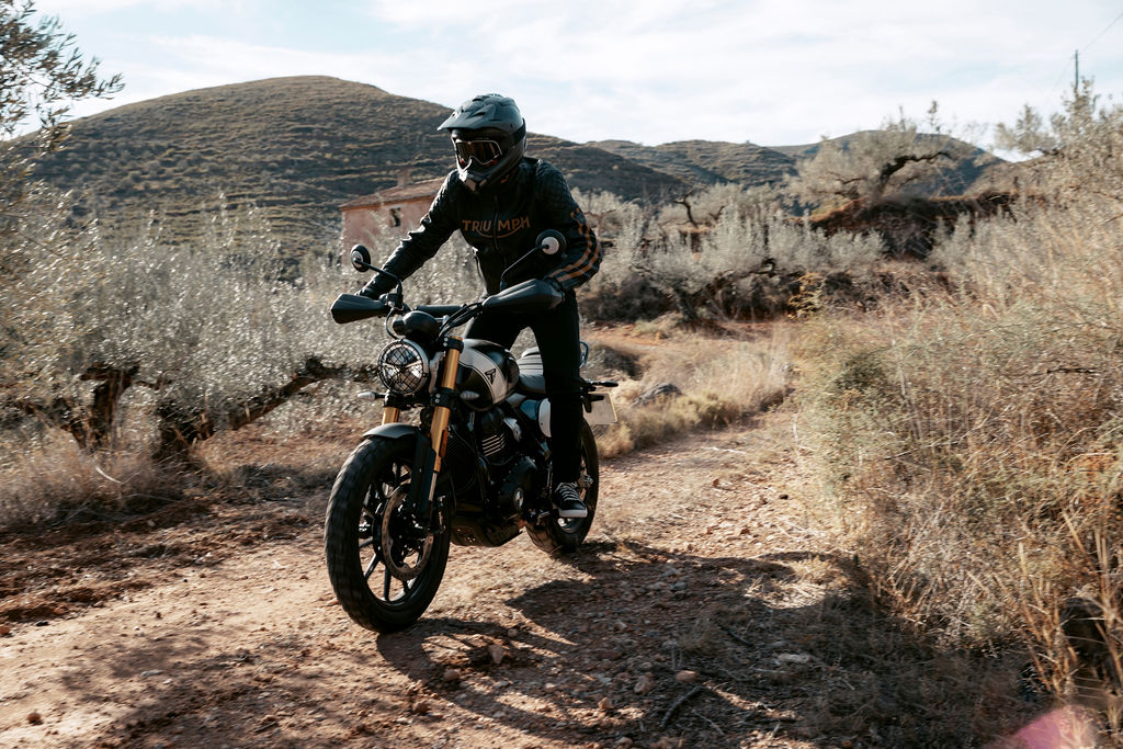 Man on triumph motorbike