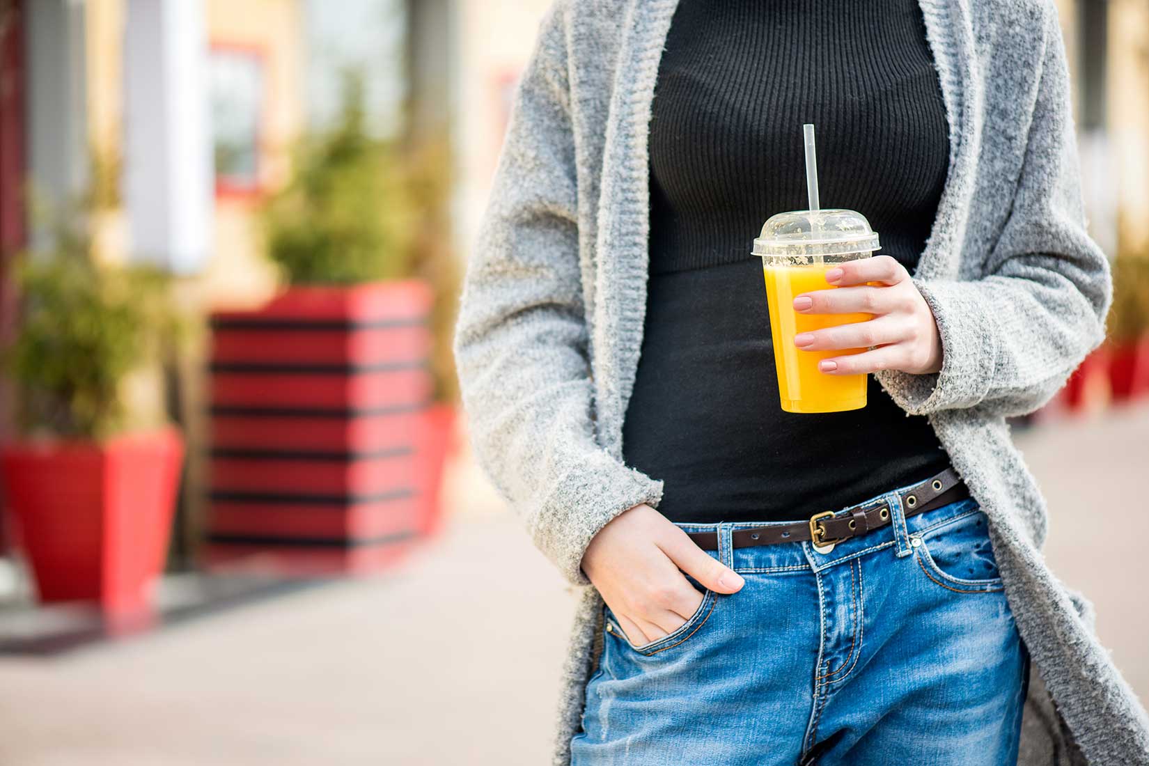 Maximizing Beverage Sales - Girl holding togo juice