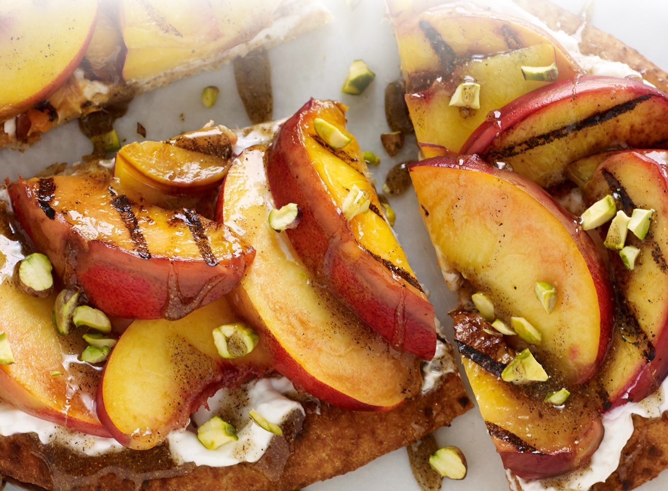 Hero - Half Width/performancefoodservice-Recipes-GRILLED_FRUIT_TART_SPICED_HONEY-heroHalf
