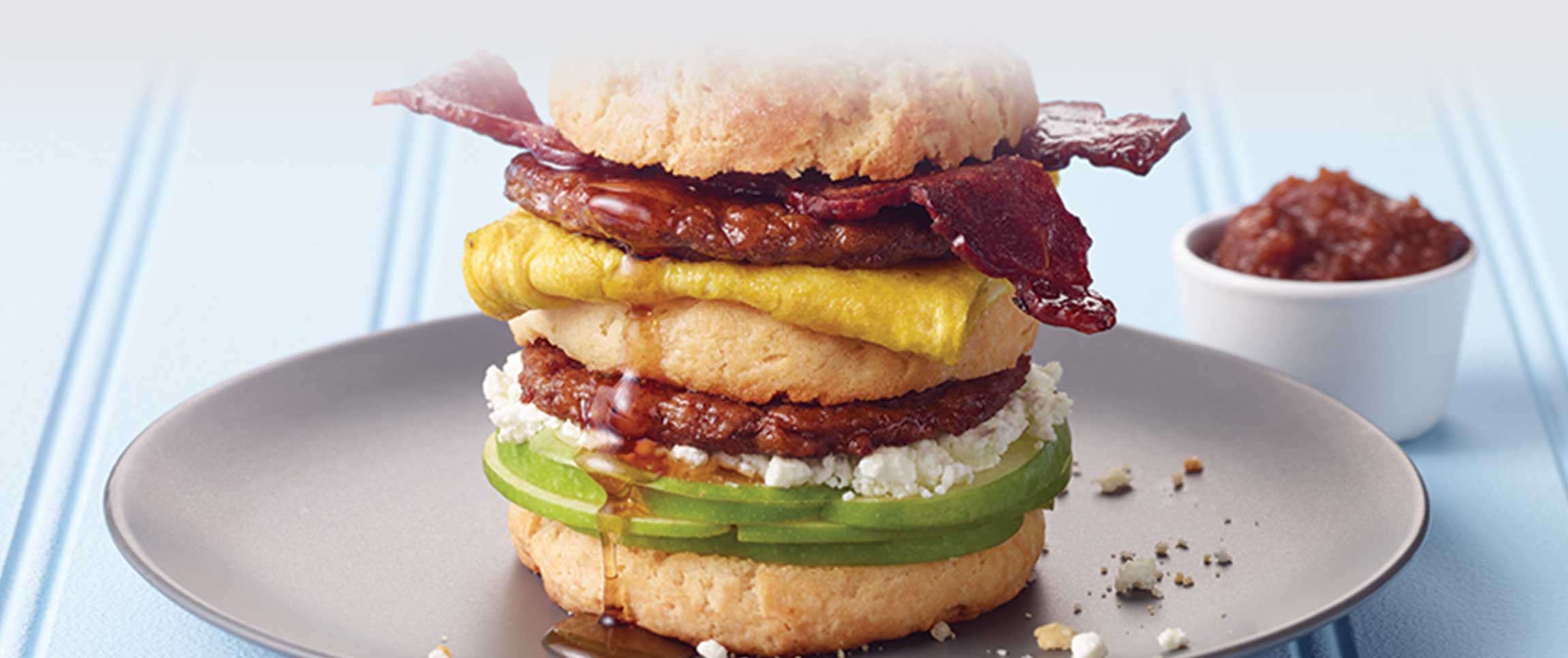 Hero - Full Width/performancefoodservice-recipes-TripleDeckerToweringBiscuitBreakfastSandwich-herofull