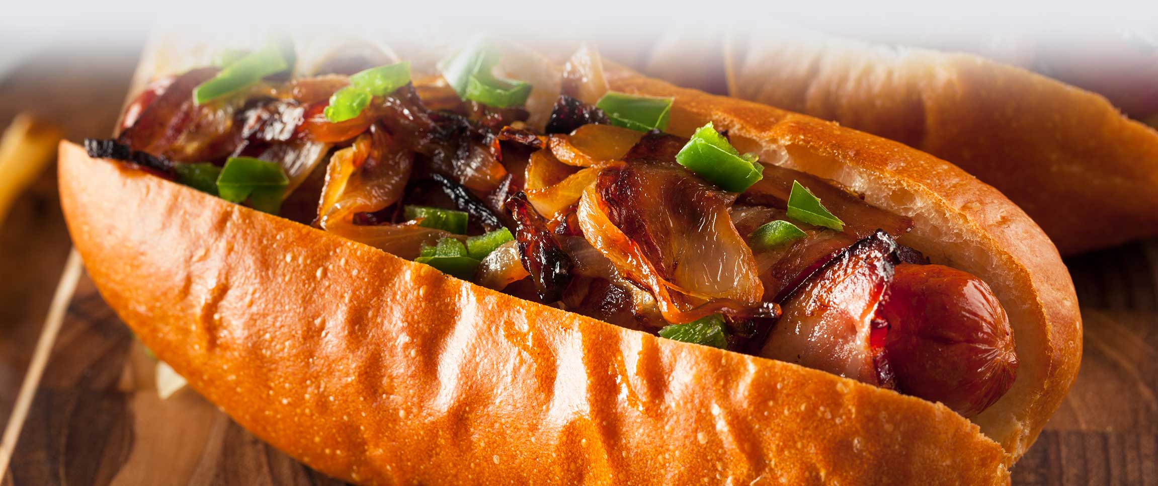 Hero - Full Width/performancefoodservice-recipes-BaconDogwithStoutOnions-herofull