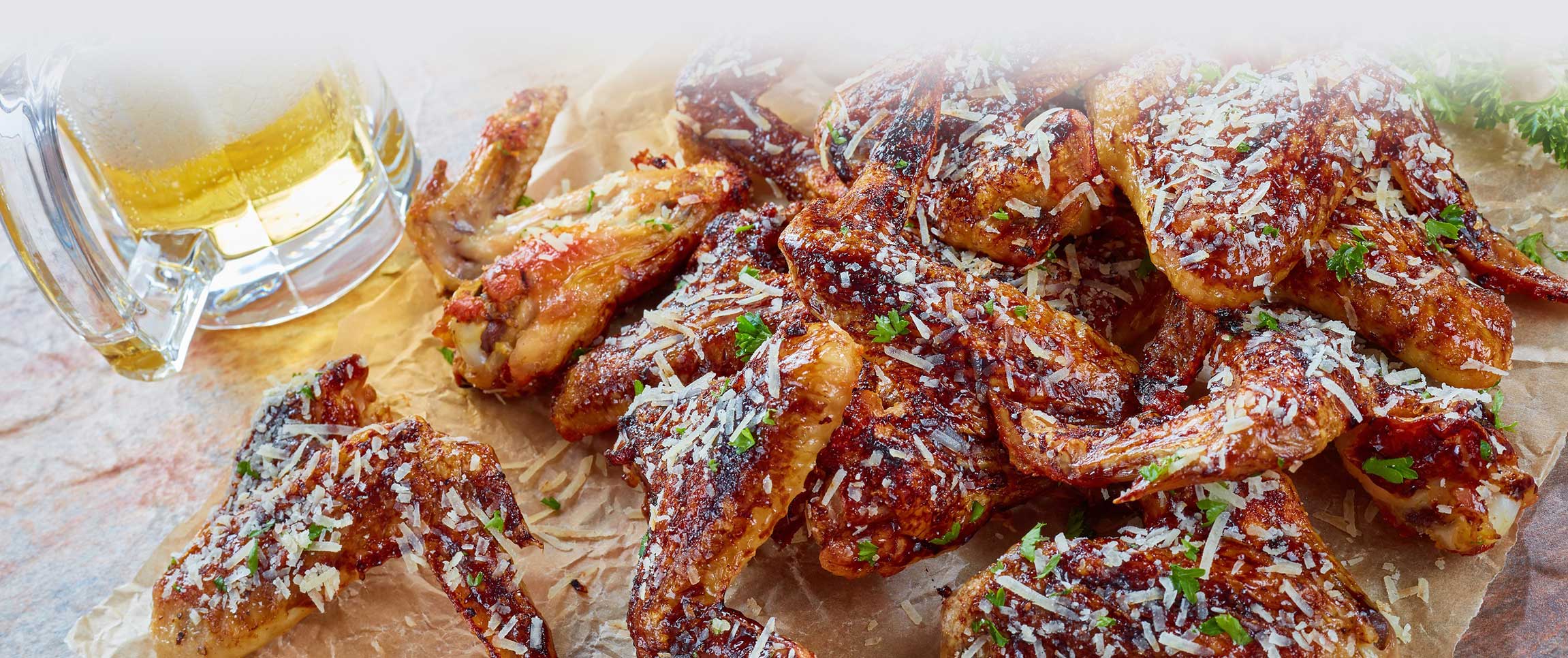 Articles/performancefoodservice-recipes-PeachBBQWings-herofull