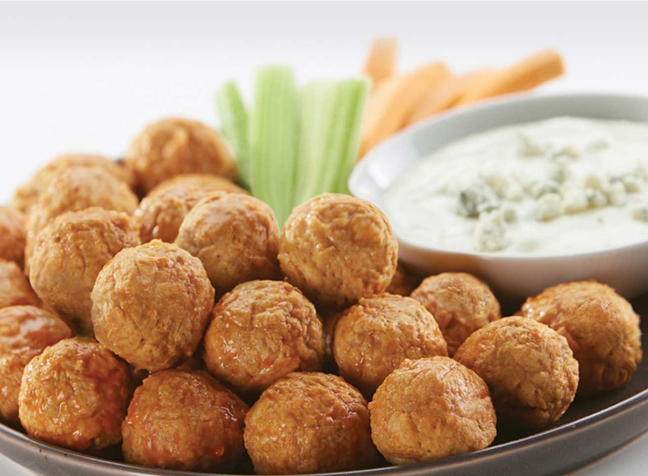 HeroFull/Performancefoodservice-NewInStock-PIM_Chicken_Meatballs-herohalf