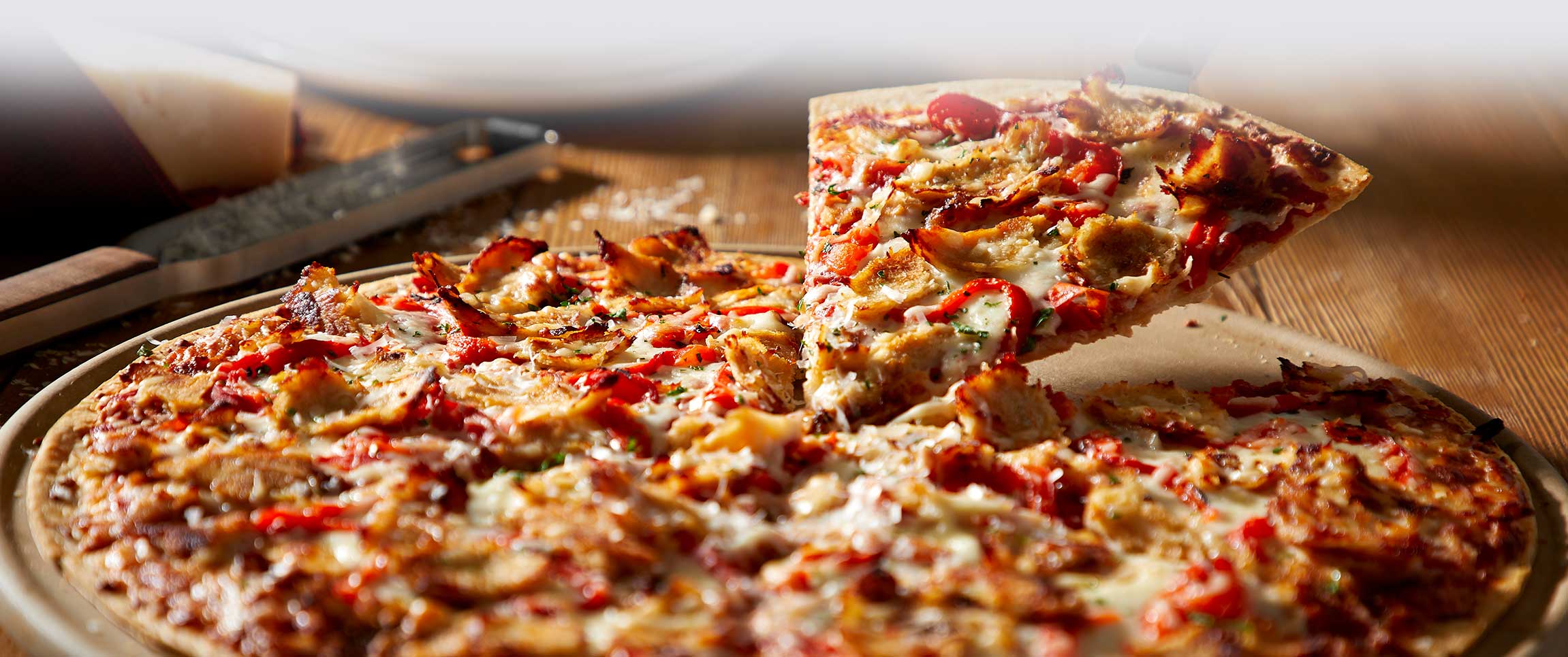 Hero - Full Width/performancefoodservice-DishRecipes-PizzaChickenCheesesteak-HeroFull