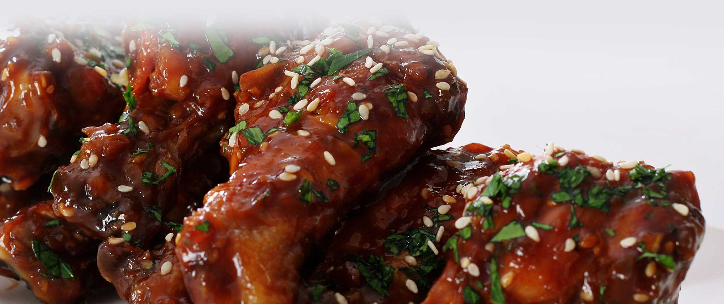 Articles/performancefoodservice-recipes-ThaiMangoChiliWings-herofull