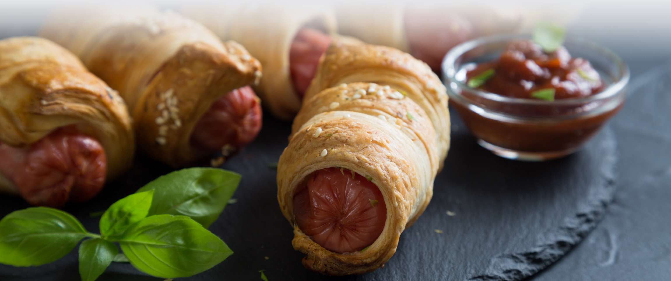 HeroFull/Performancefoodservice-NewInStock-PIM_Dough_Wrapped_Sausages-herofull