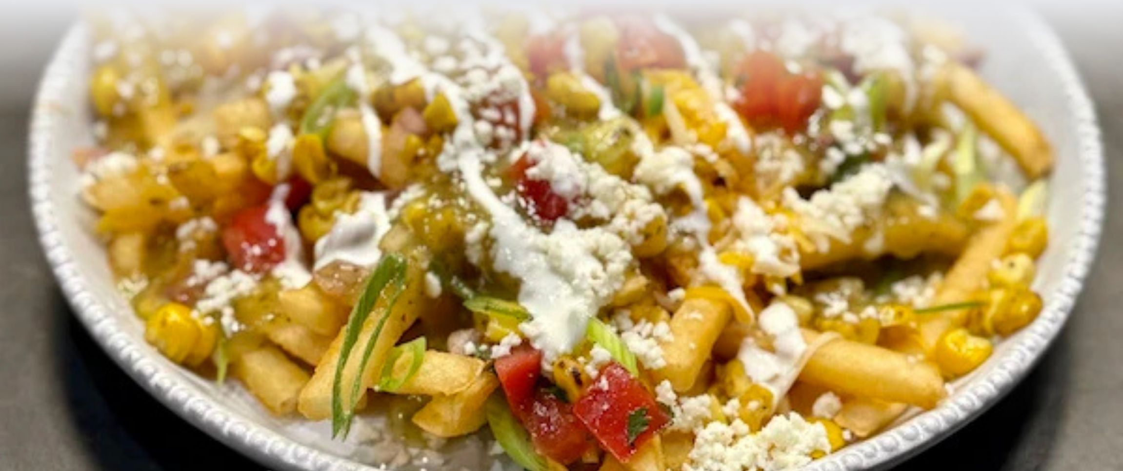 Hero - Full Width/performancefoodservice-Recipes-Loaded_Latin_Street_Fries-herofull