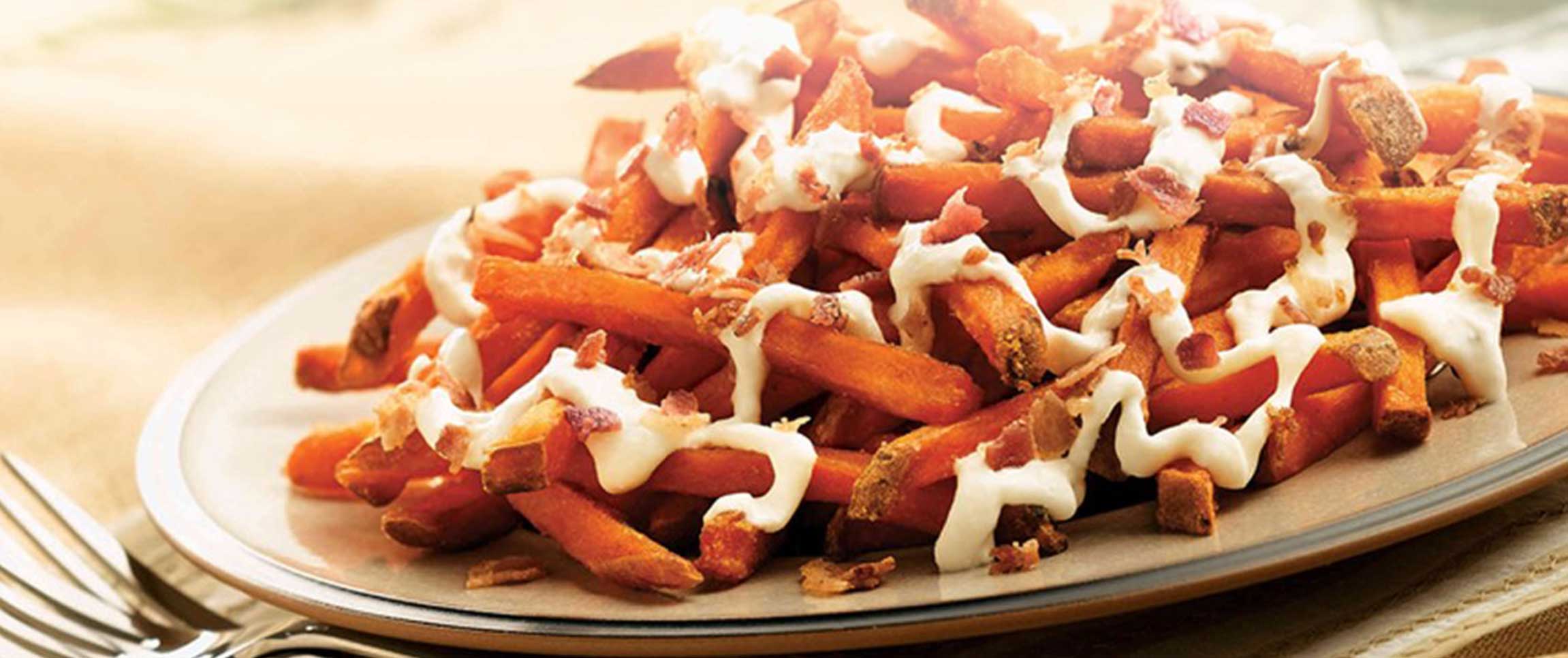 performancefoodservice-Recipes-BACONSWPOTATOSTICKS-heroFull/performancefoodservice-Recipes-Smoked-Bacon-Sweet-Potato-Stix-with-Apple-Sour-Cream-Dip-heroFull