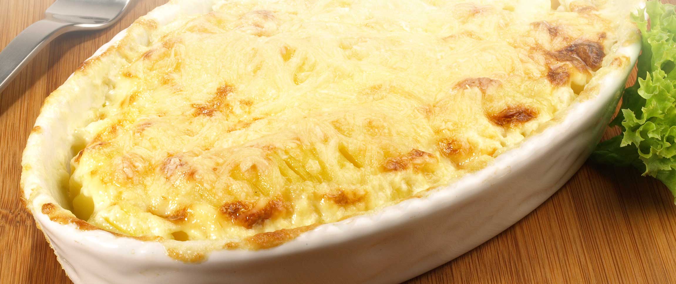 Hero - Full Width/performancefoodservice-Recipes-PotatoAndSmokedGoudaGratinee-HeroFull
