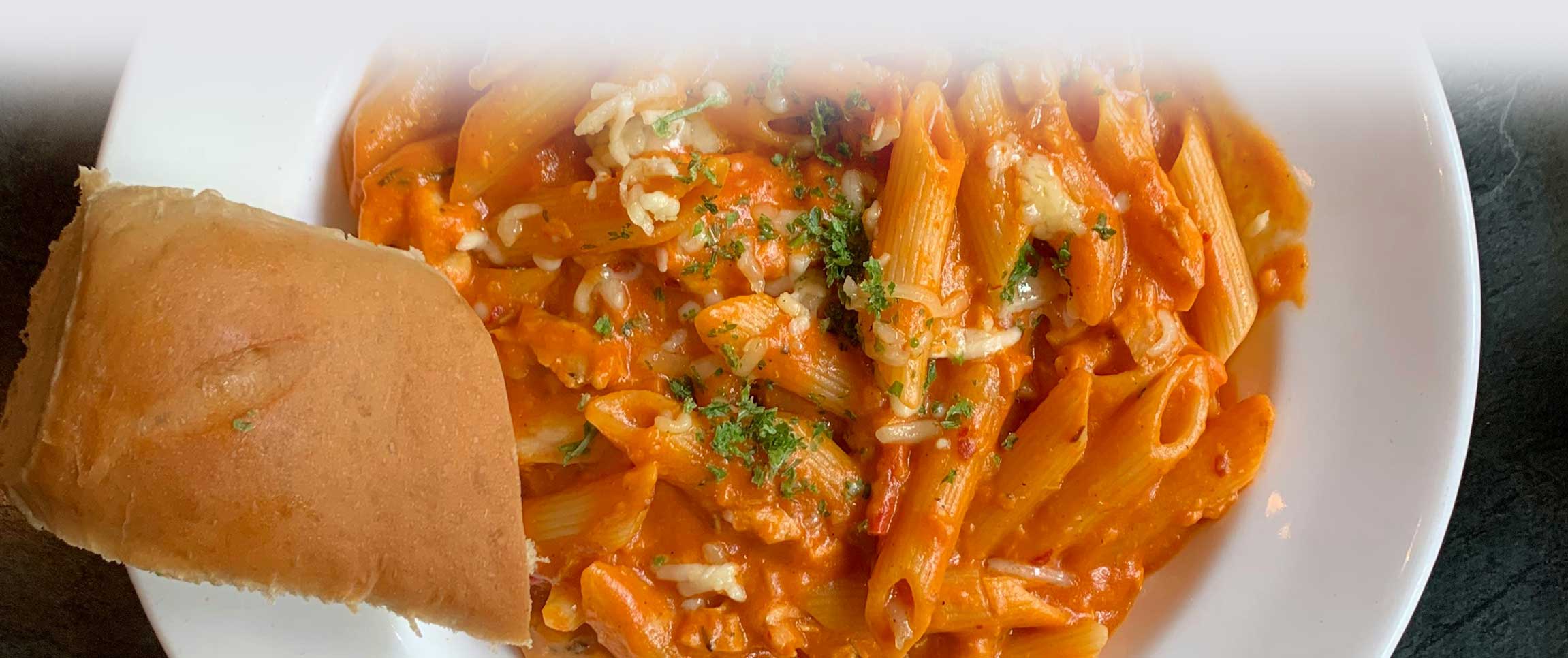 Hero - Full Width/performancefoodservice-recipes-Penne_with_Tomato_Cream_Cheese_Sauce-herofull