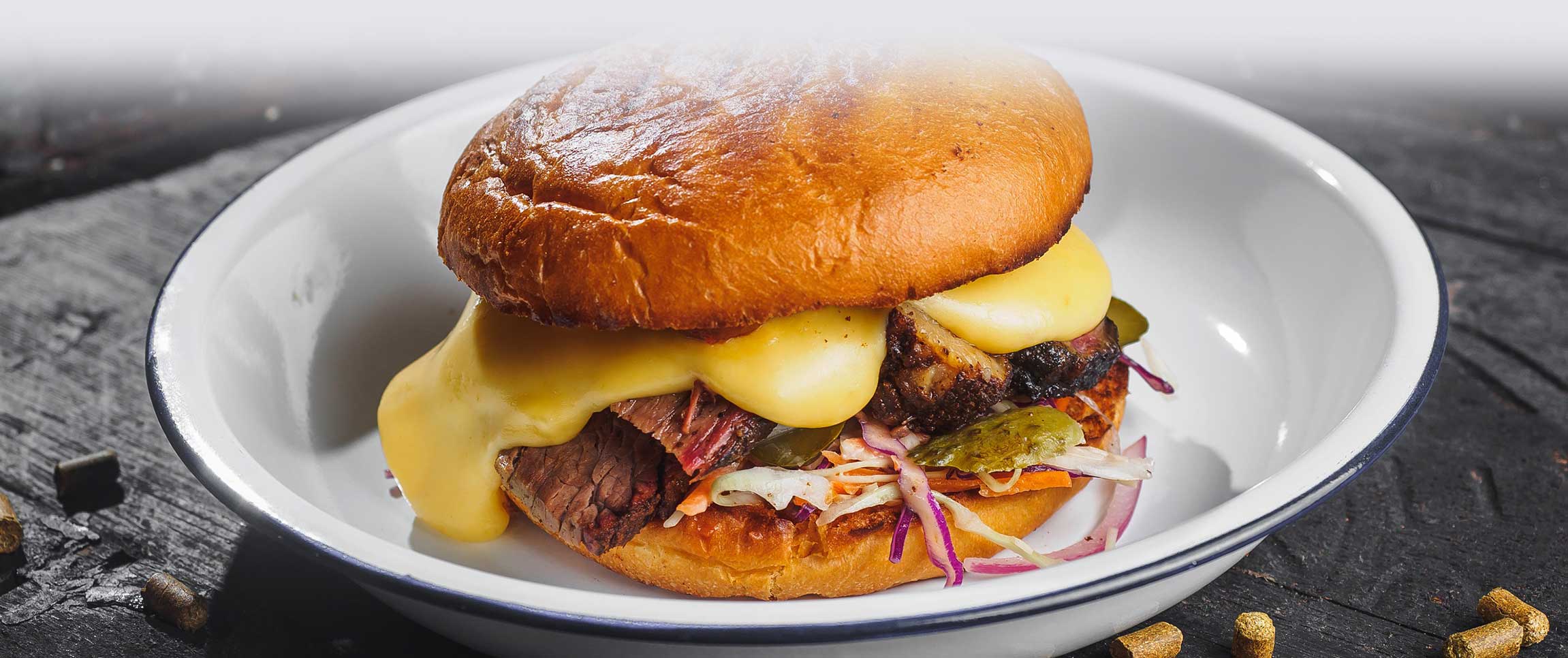 Hero - Full Width/performancefoodservicerecipesBrisketCheddarBaconBurgerherofull