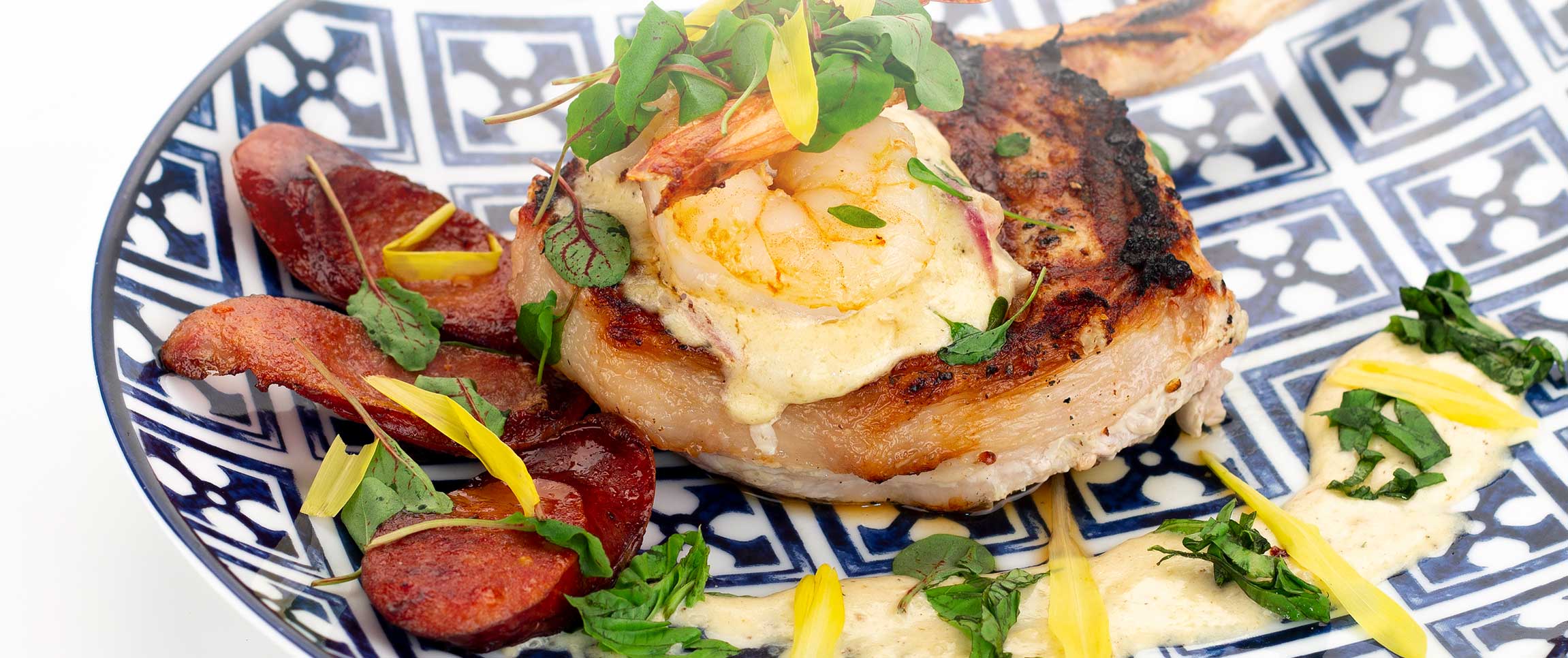 Hero - Full Width/performancefoodservice-Recipes-porterhouseandouille-HeroFull