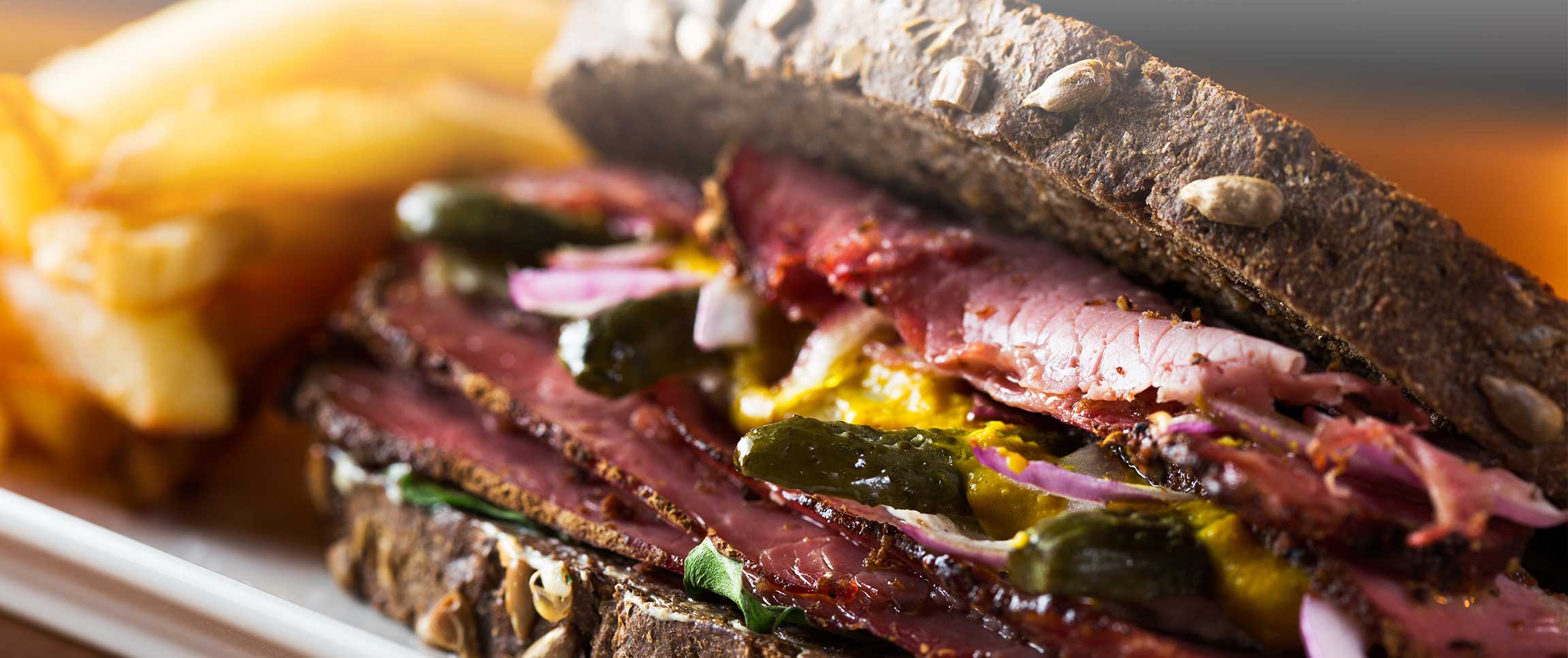 Hero - Full Width/performancefoodservice-Recipes-PastramiSandwich-heroFull