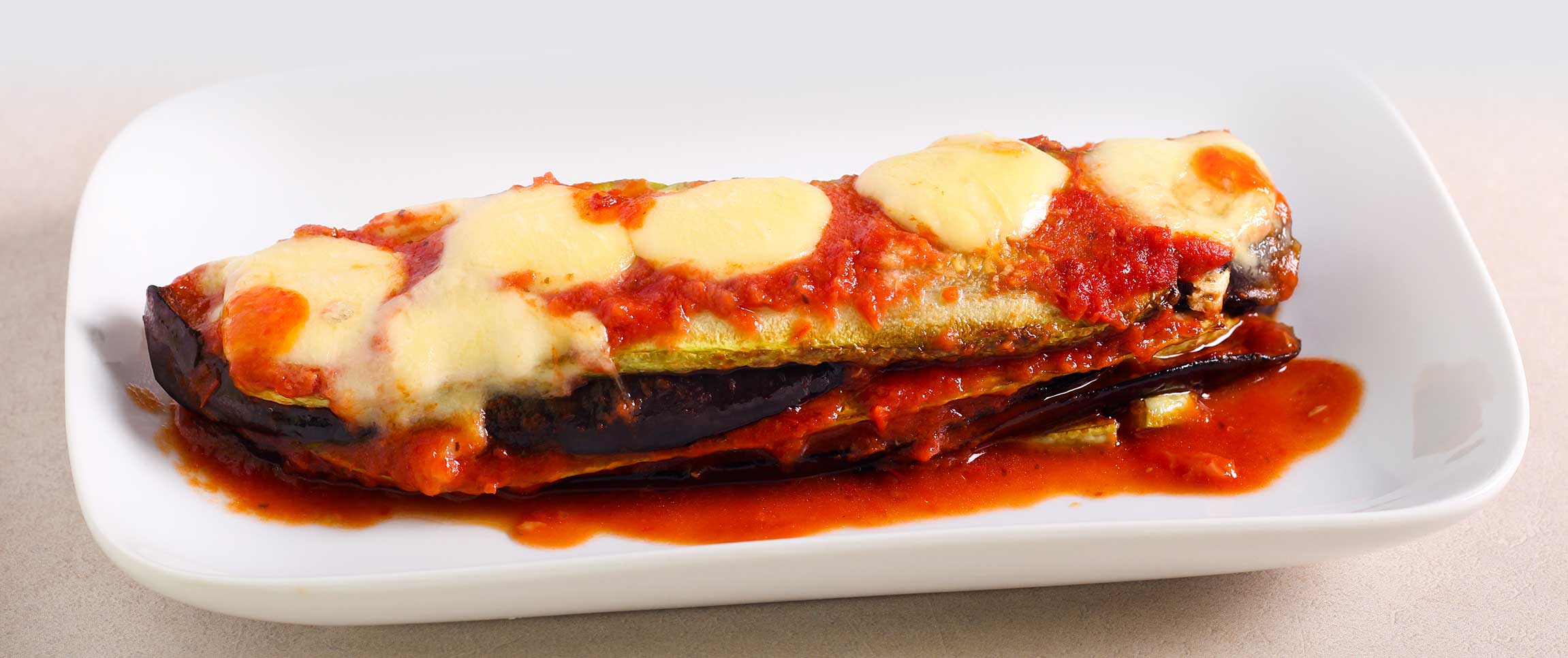 Hero - Full Width/performancefoodservice-Recipes-RoastedEggplantZucchiniLasagna-herofull