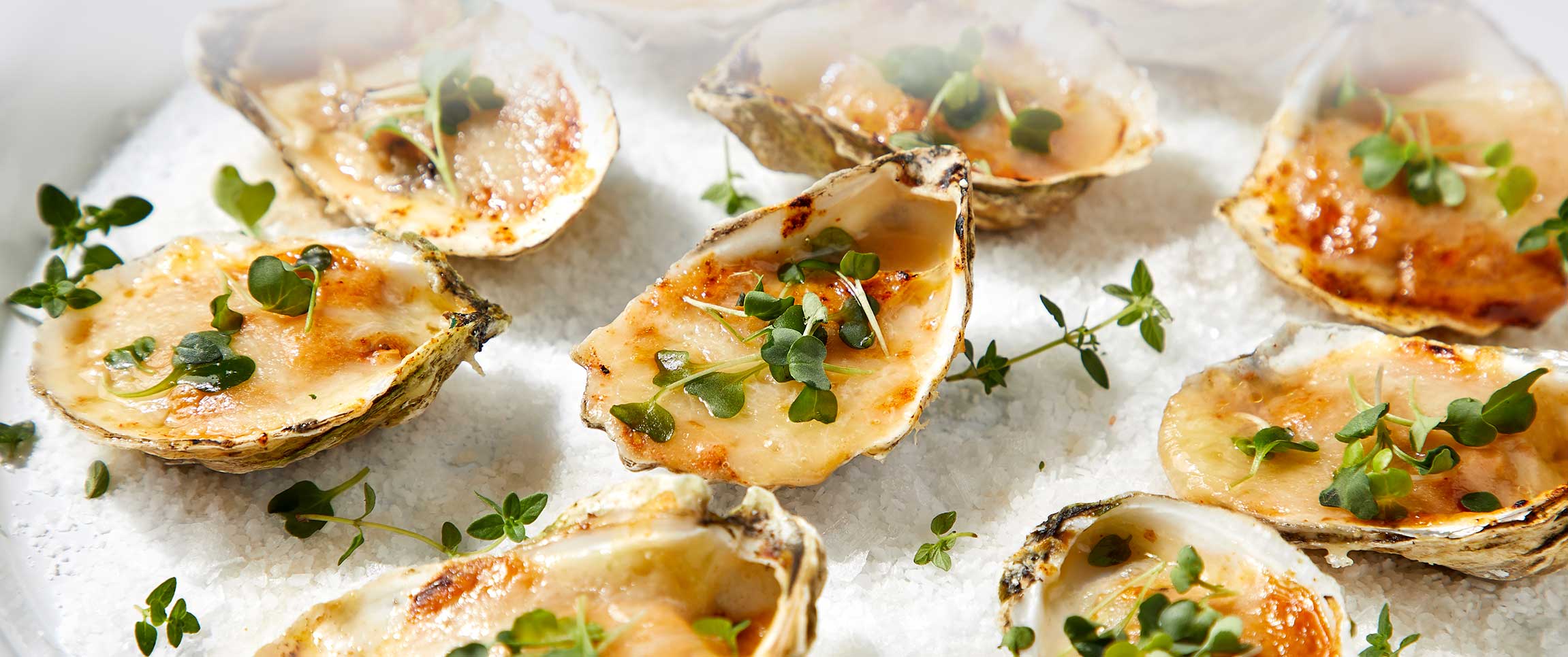 Hero - Full Width/performancefoodservice-DishRecipes-ChargrilledOysters-HeroFull