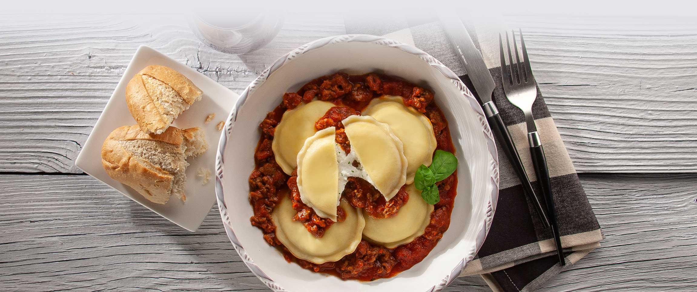 Hero - Full Width/performancefoodservice-recipes-GourmetCheeseRavioliWithBologneseSauce-herofull