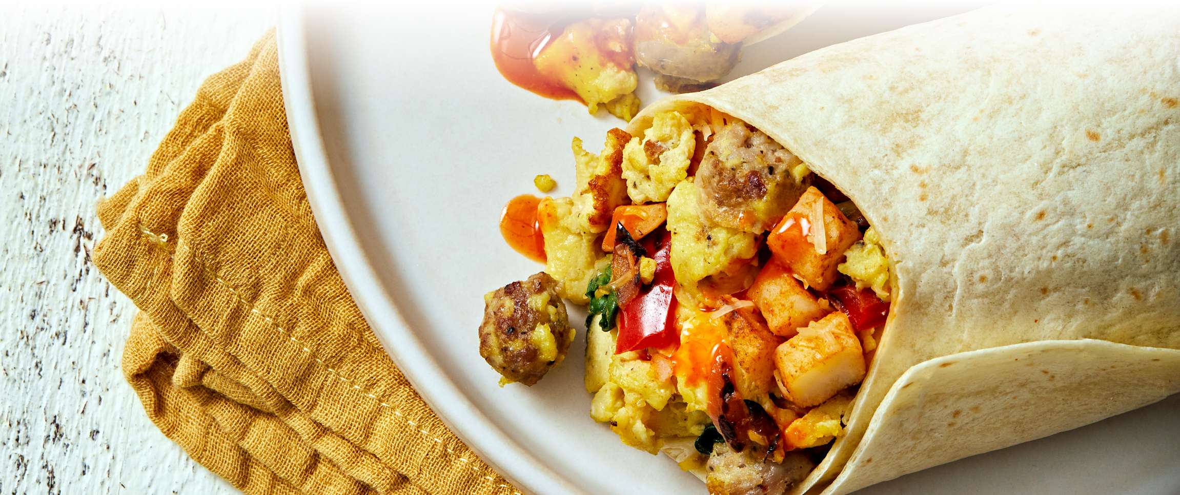 Hero - Full Width/Performancefoodservice-Recipes-Chorizo_Steak_and_Egg_Burrito-herofull