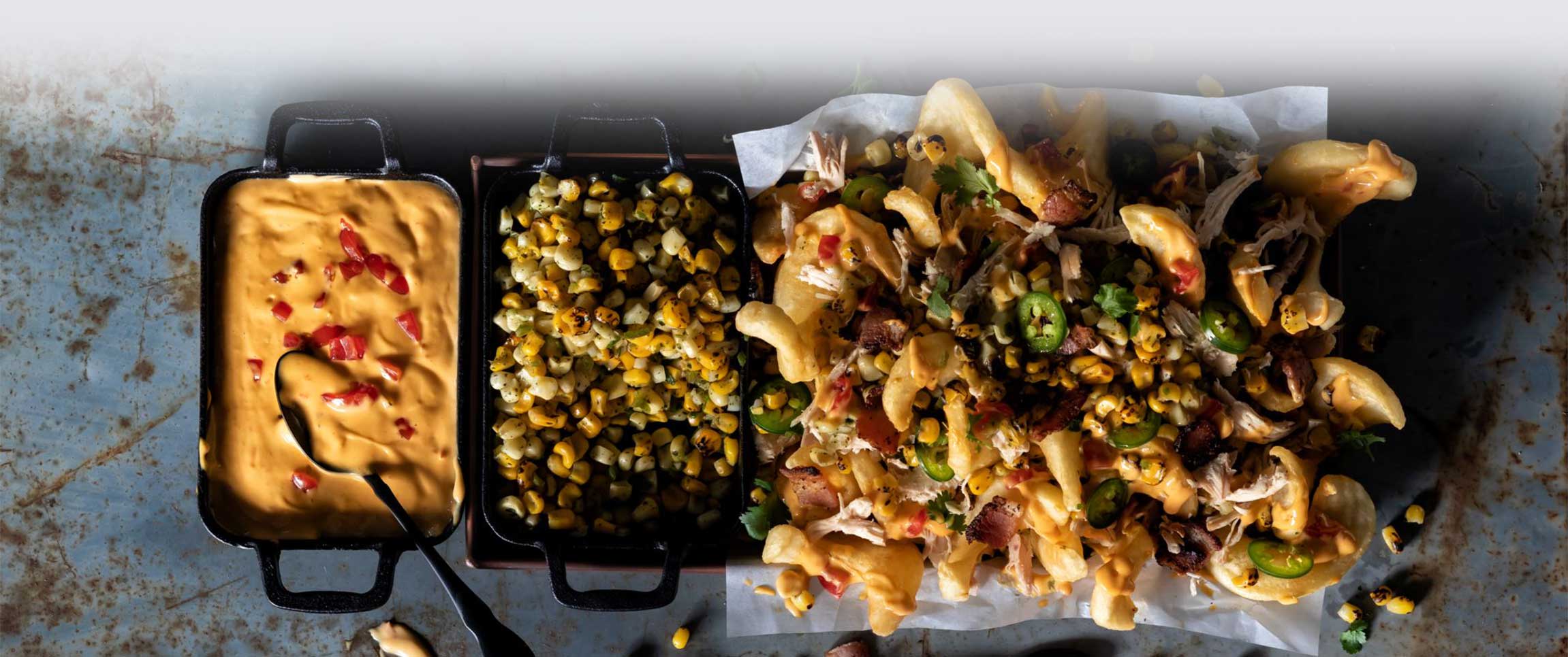 Hero - Full Width/performancefoodservice-recipes-SIDEWINDERSFriesLoadedChickenNachos-herofull