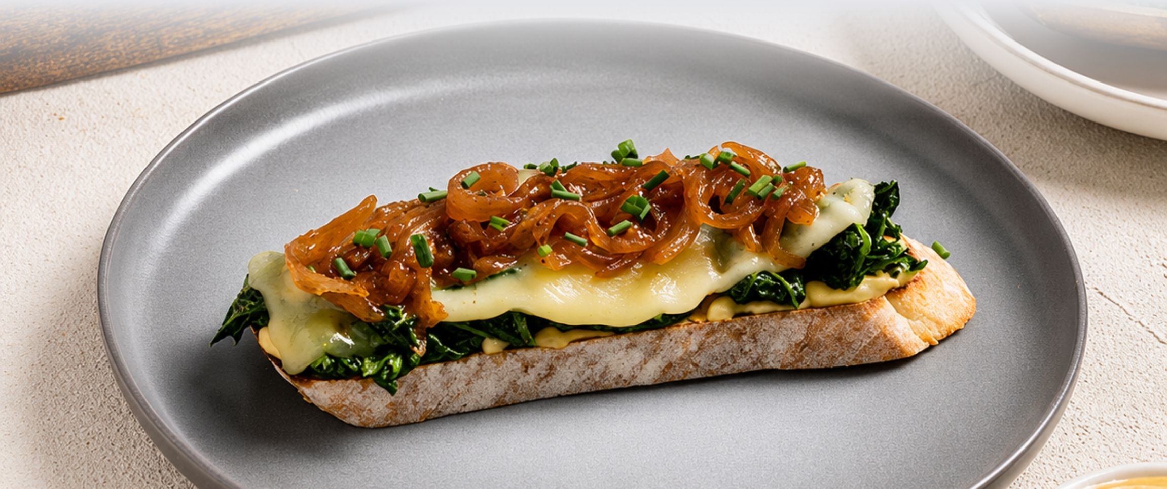 Hero - Full Width/performancefoodservice-Recipes-Kale_Raclette_Tartine-herofull