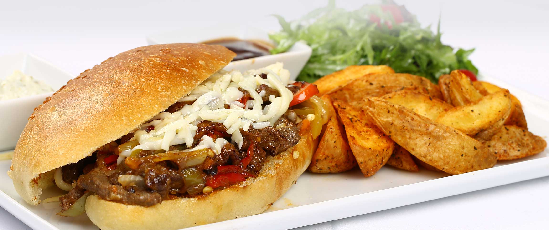 Hero - Full Width/performancefoodservice-Recipe-PhillyBeastBurger-Herofull