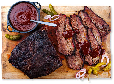 sliced brisket on a cutting board