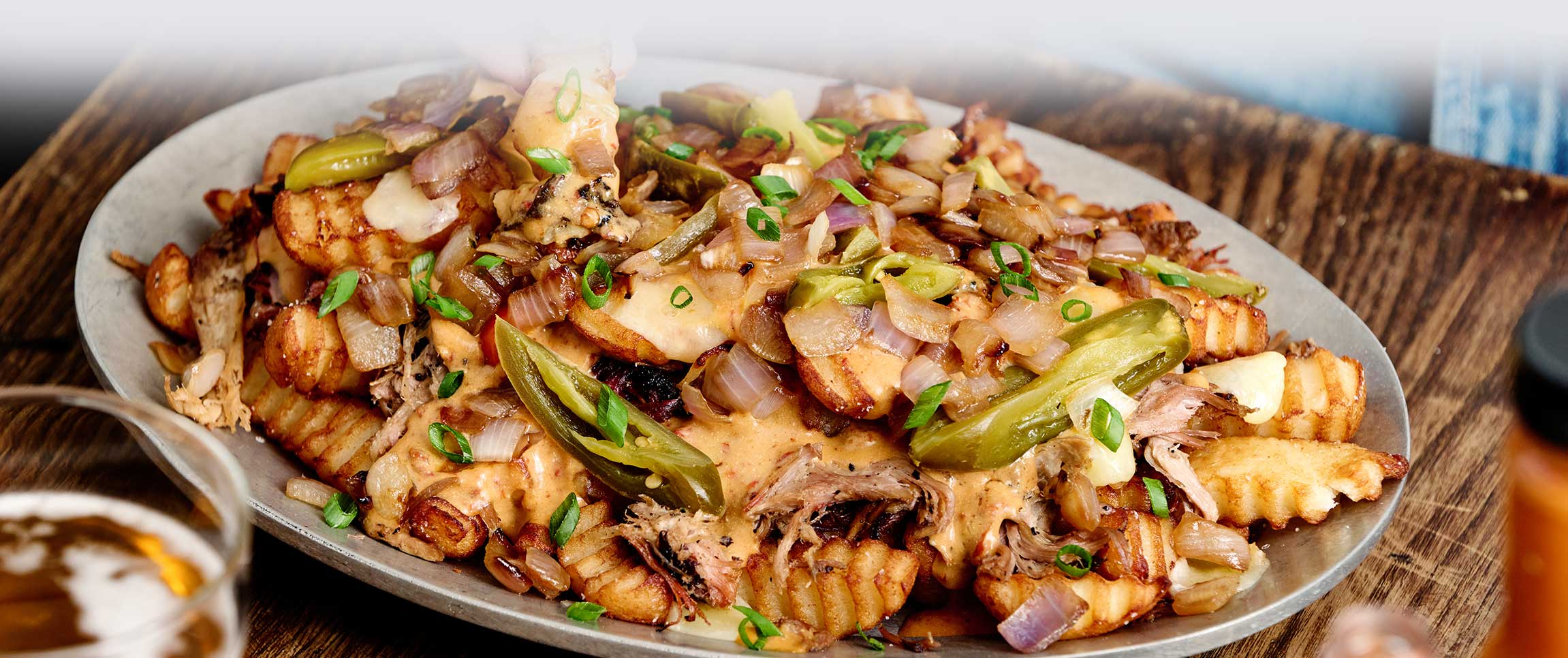 Hero - Full Width/performancefoodservice-DISHRecipes-LoadedPulledPorkFries-herofull