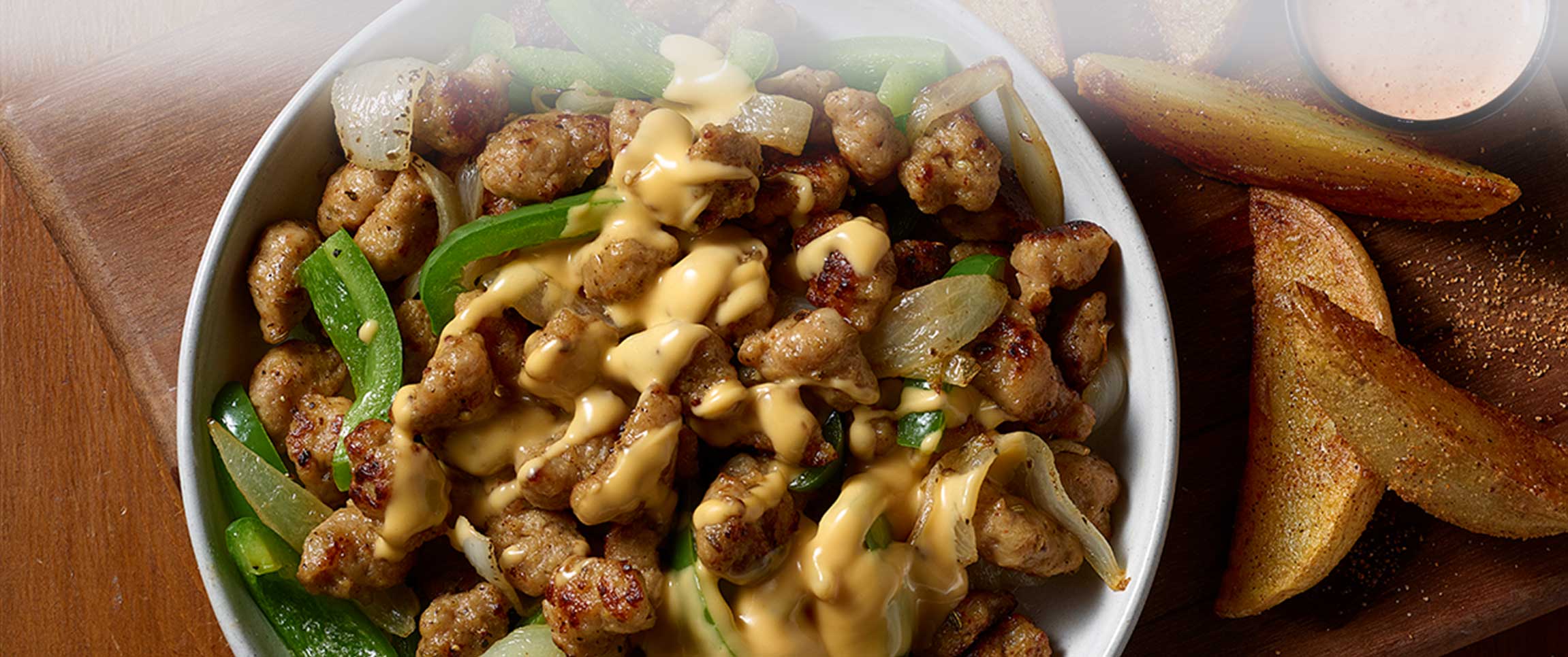 Hero - Full Width/performancefoodservice-recipe-Sausage_Onion_Pepper_Cheese_Bowl-herofull