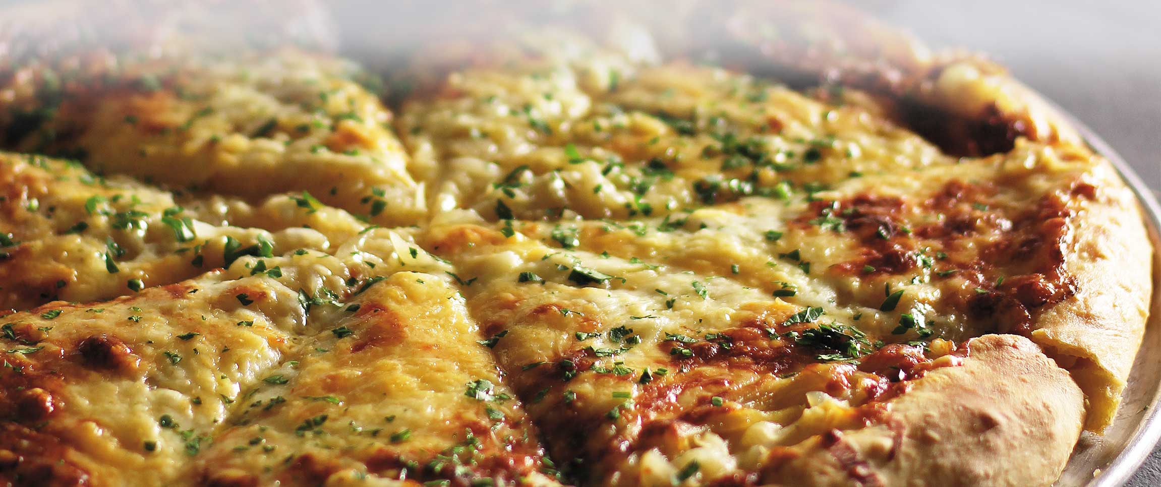 Hero - Full Width/performancefoodservice-recipes-StuffedCrustOnionPizza-herofull