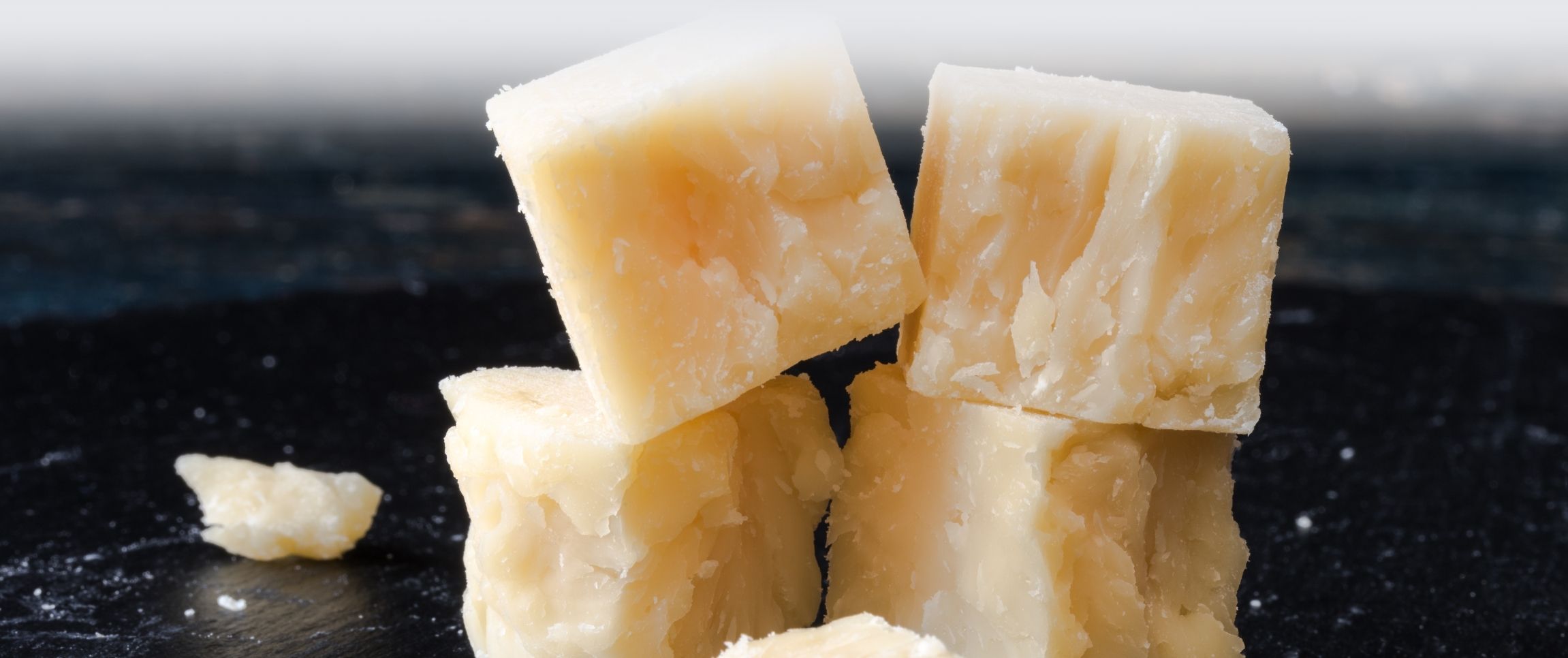 Feature/performancefoodservice-NewInStock-Roma_White_Cheddar_Block-HeroFull