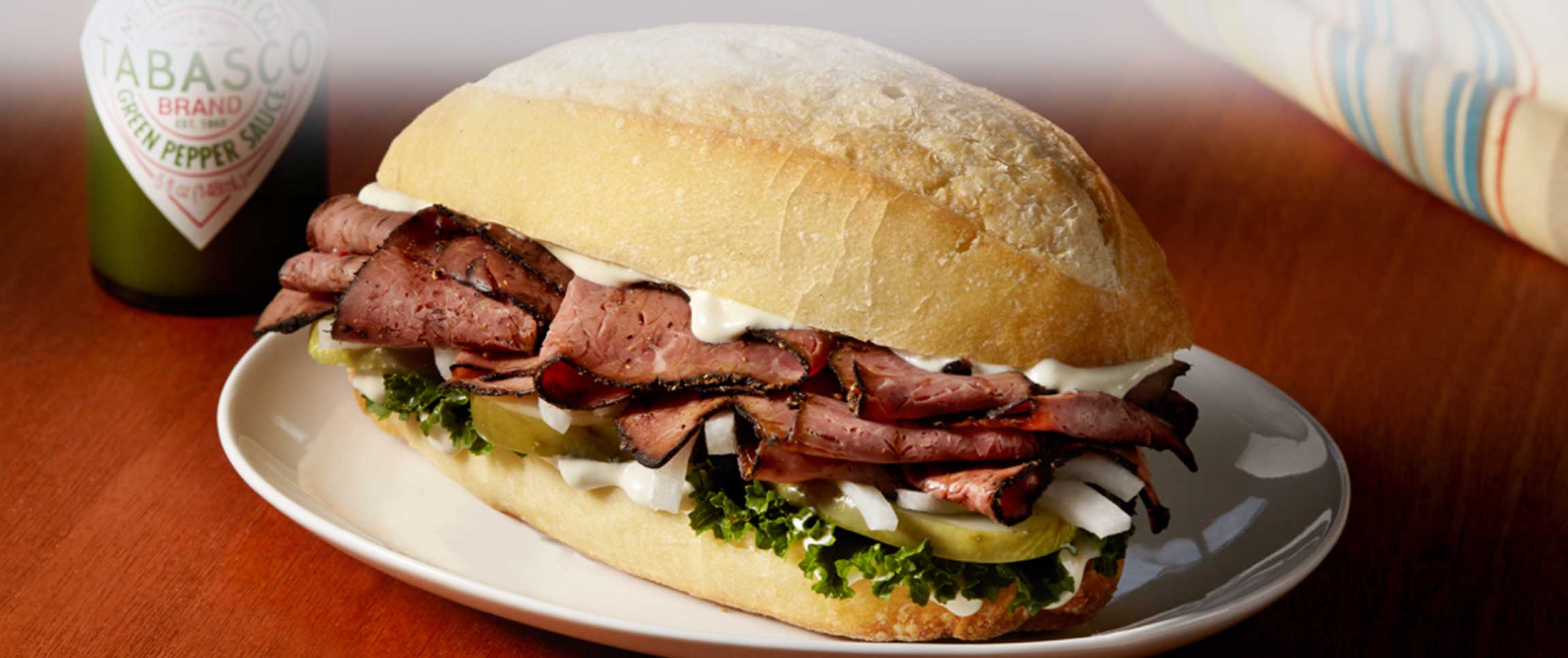Hero - Full Width/performancefoodservice-recipes-PastramiBahnMi-herofull