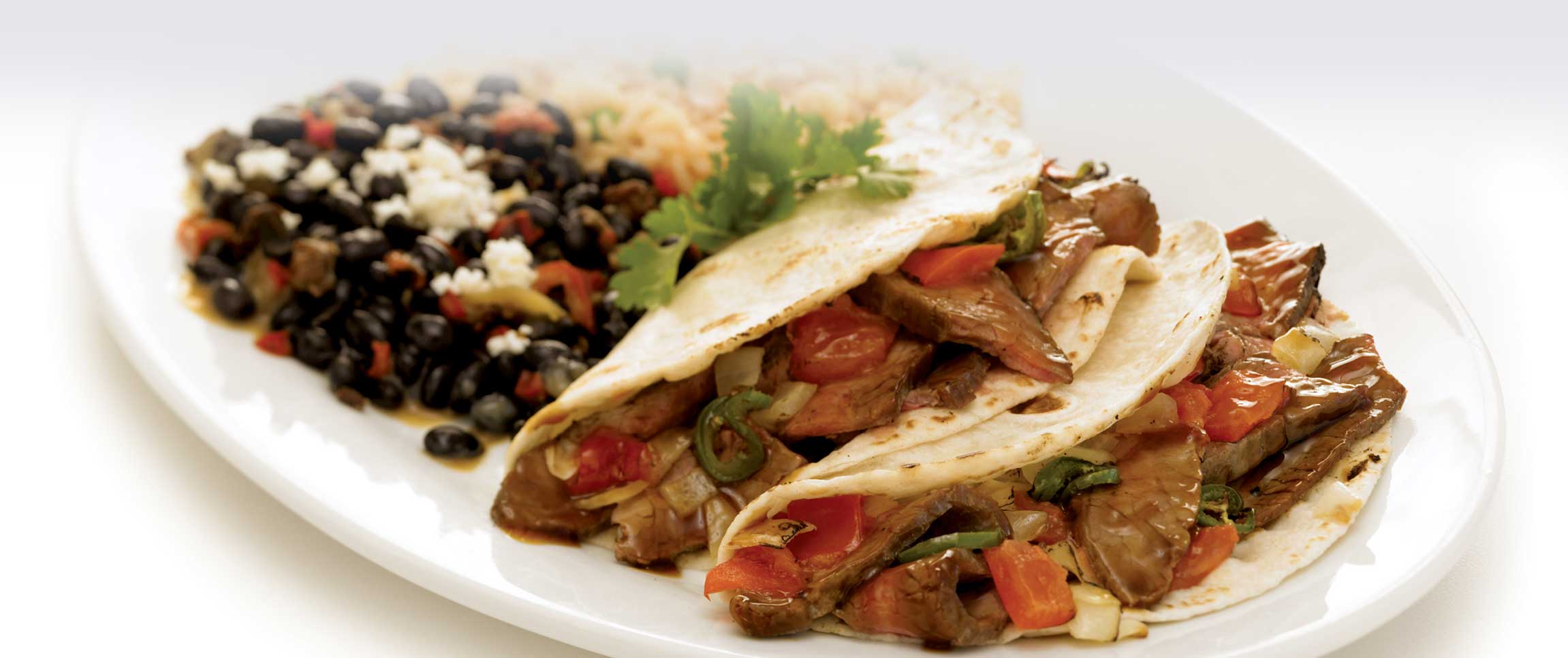 Hero - Full Width/performancefoodservice-recipes-CarneAsadaSoftTacos-herofull
