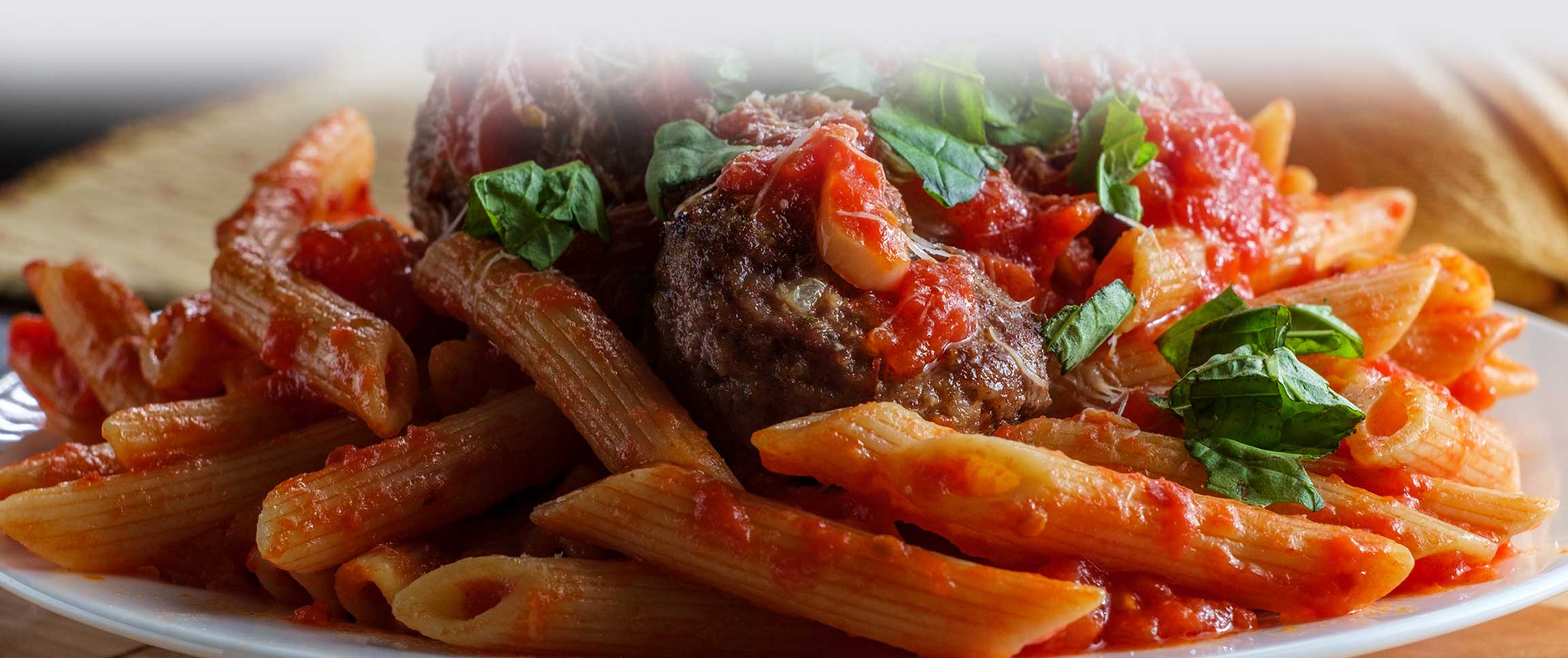 Hero - Full Width/performancefoodservice-Recipes-PennePastaWithMeatballs-herofull