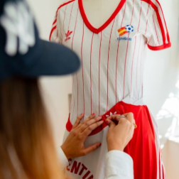 Soccer jersey being adjusted