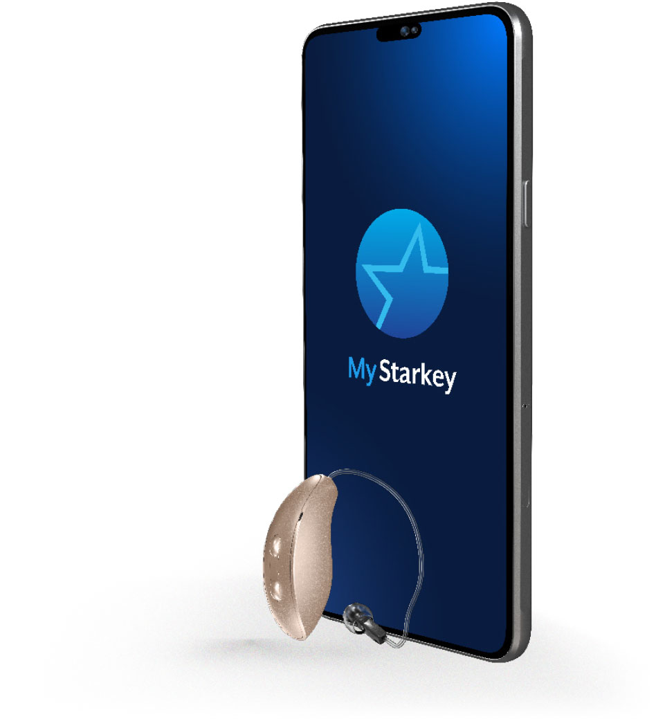 A beige RIC 312 hearing aid next to a smartphone displaying the My Starkey app